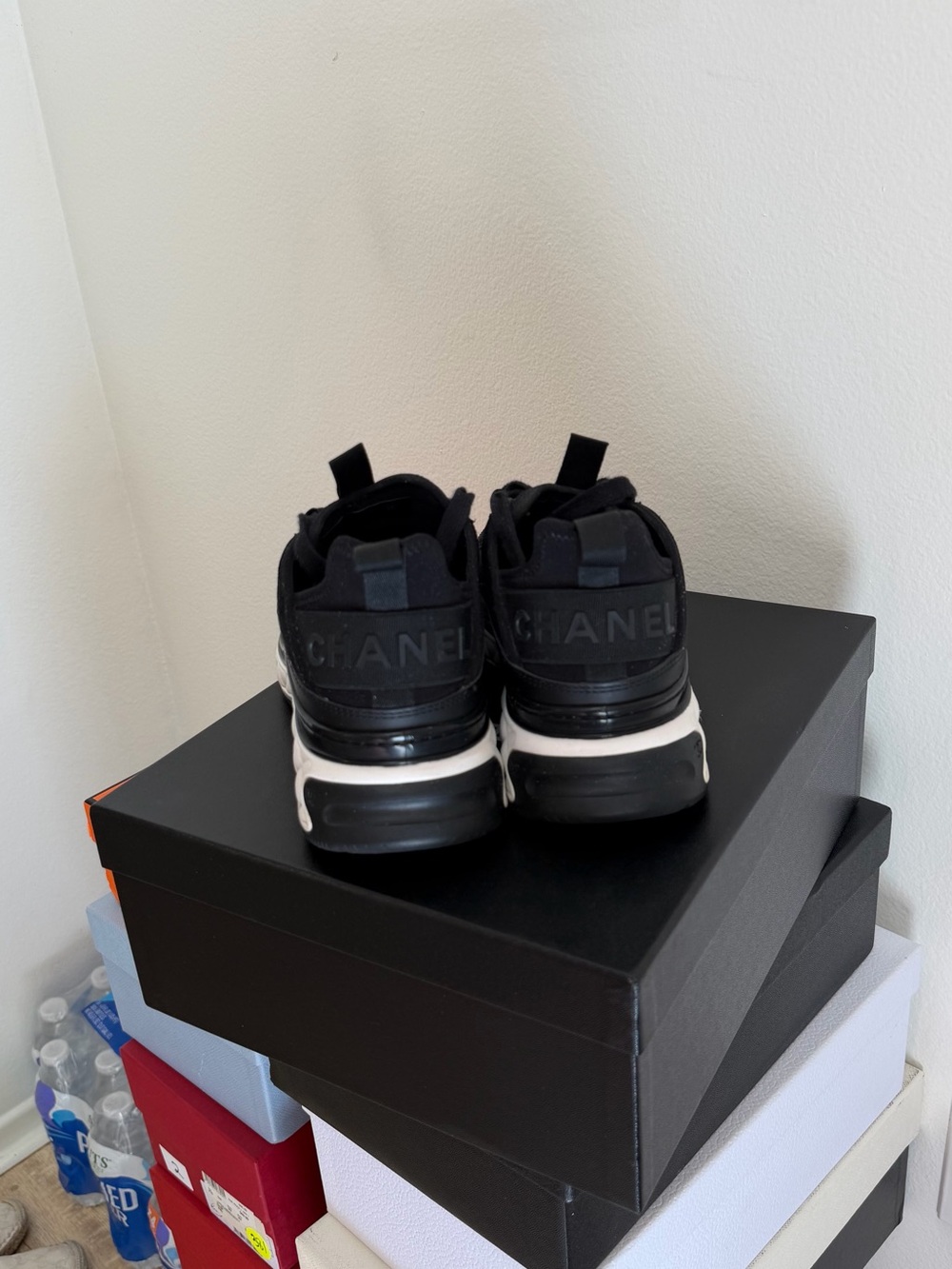 CHANEL Black and White Quilted-Sole Sneakers with Gold CC - Picture 6 of 8